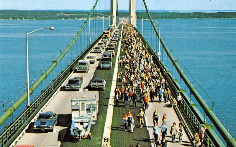 Image: Vintage Michigan Labor Day Walk - Mackinac Bridge by Yesterdays-Paper, licensed for commercial use from DeviantArt.